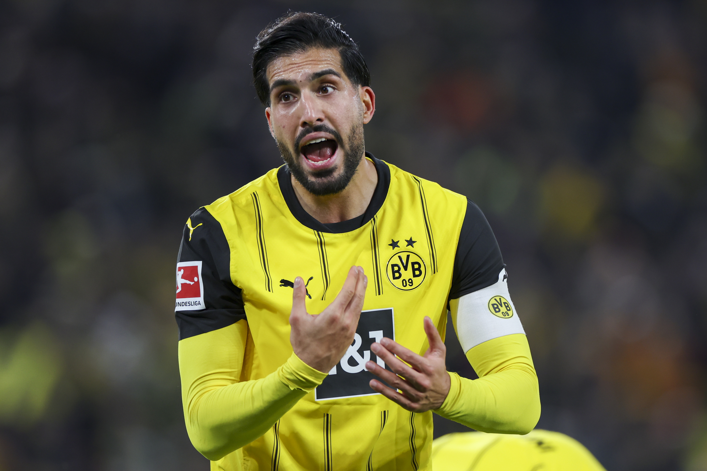 Borussia Dortmund's Emre Can complains after being sent off against Mainz 05