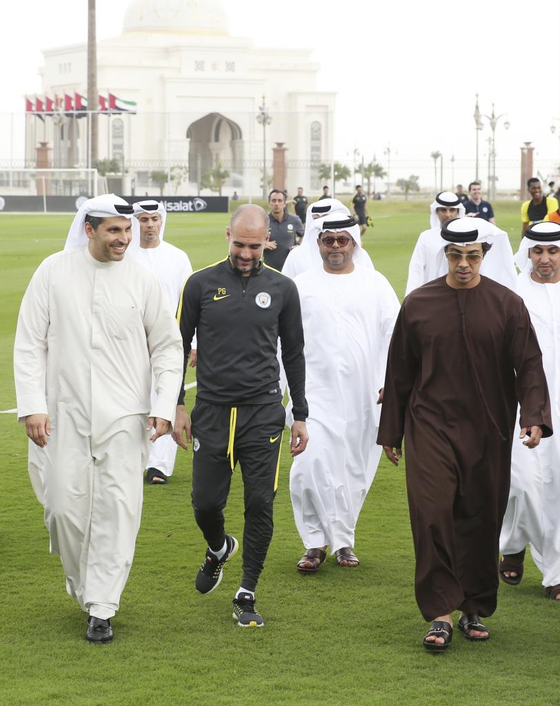 Pep Guardiola, along with HH Sheikh Mansour and Khaldoon Al Mubarak, among others.