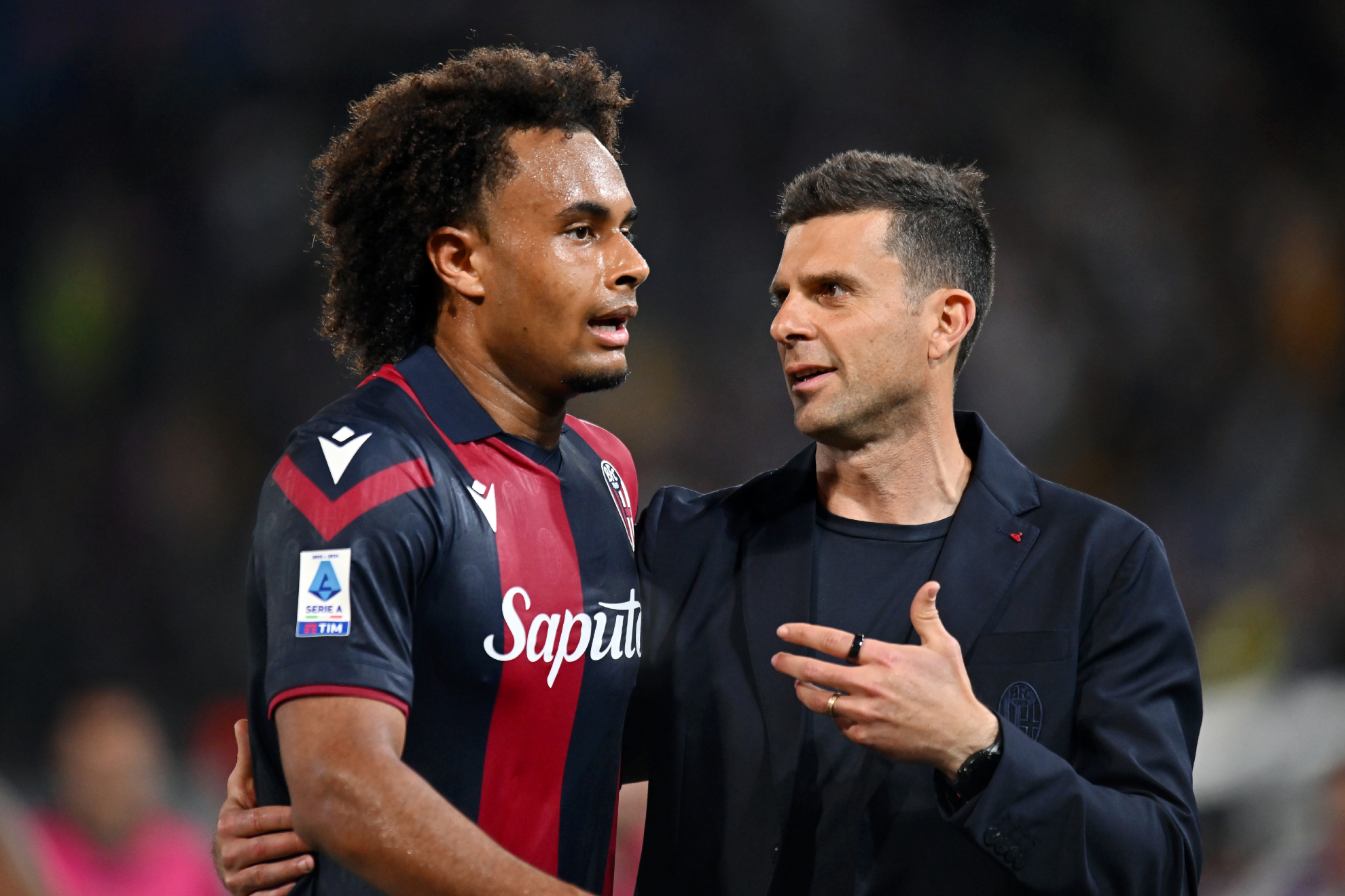 Zirkzee with Thiago Motta.