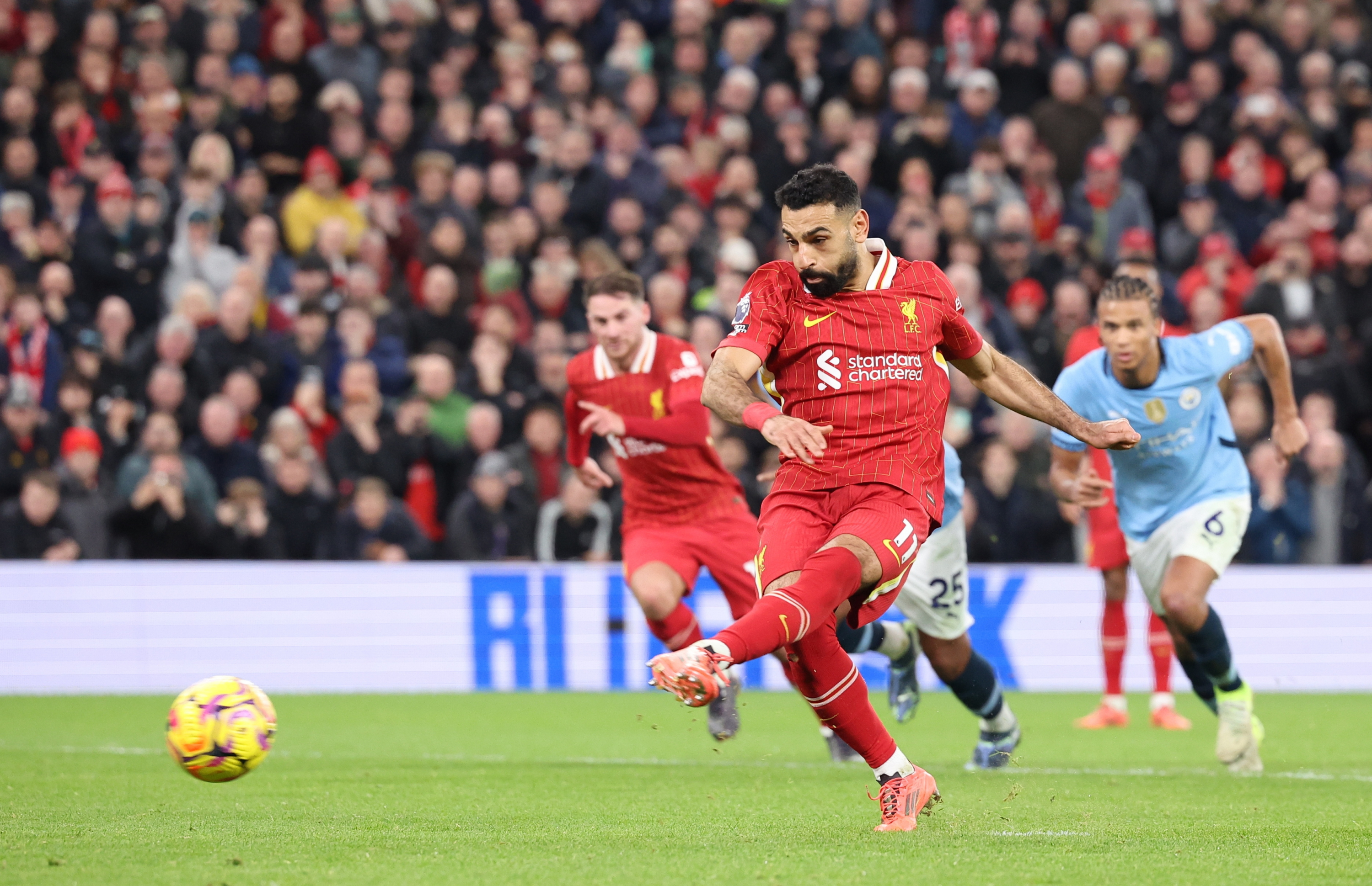 Salah, converting his penalty against Manchester City