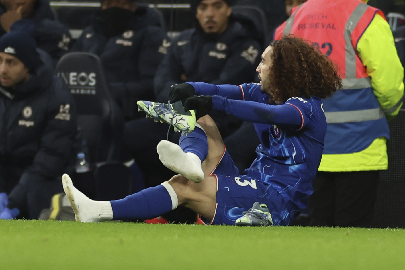 Marc Cucurella changing boots at Tottenham 3-4 Chelsea