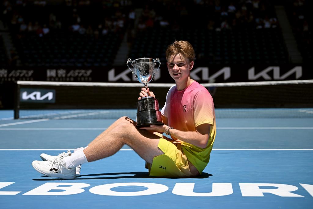 Henry Bernet poses with the Australia Junior Open trophy