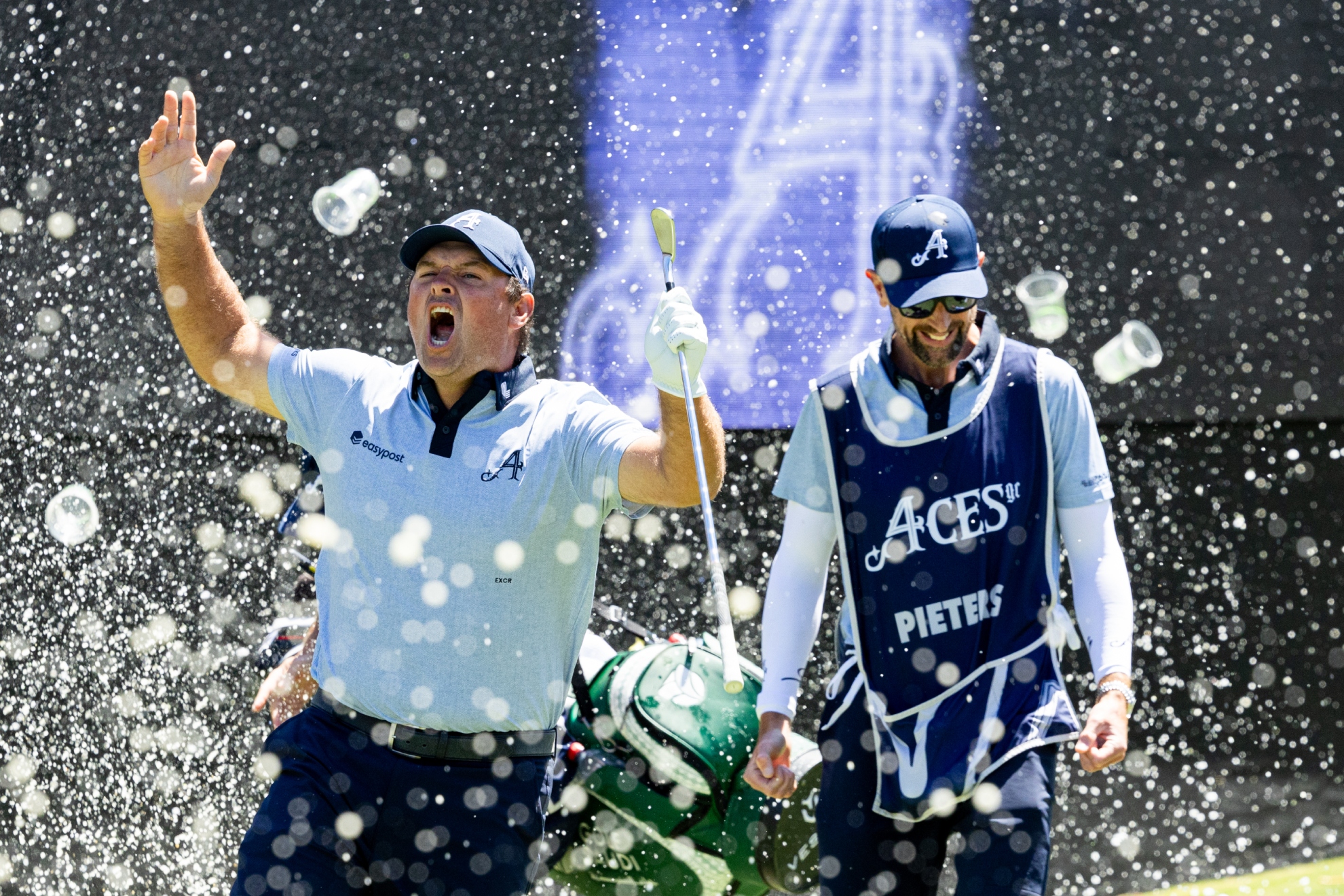 Patrick Reed celebrates his hole in one