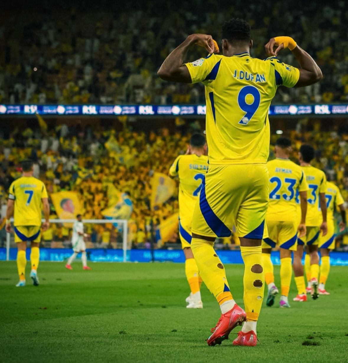 Durán celebrating a goal and showing his shirt.