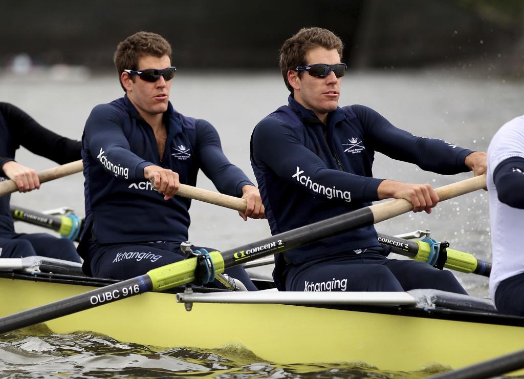 The Winklevos brothers, paddling in 2010.