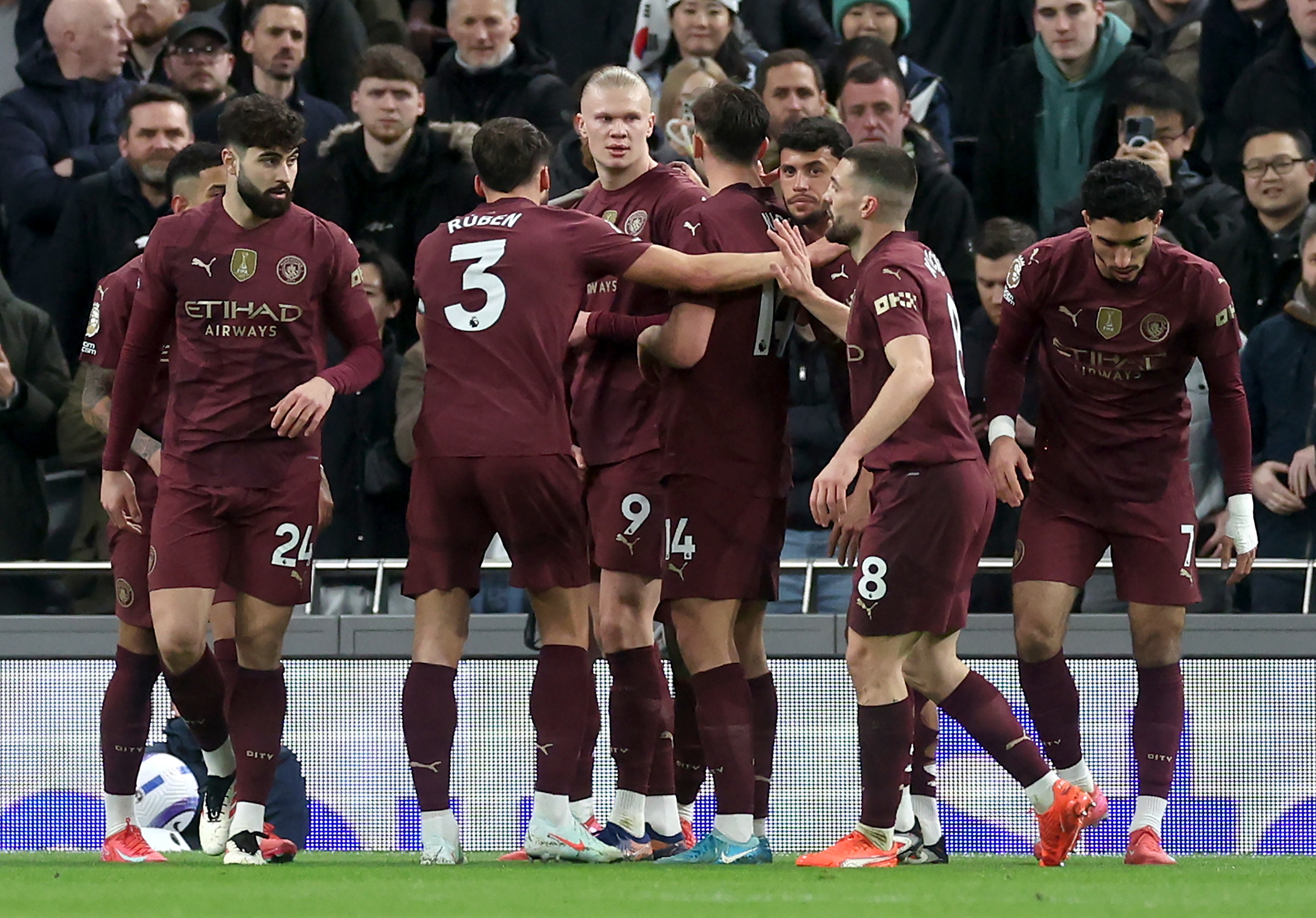 City players celebrate Haaland's goal.