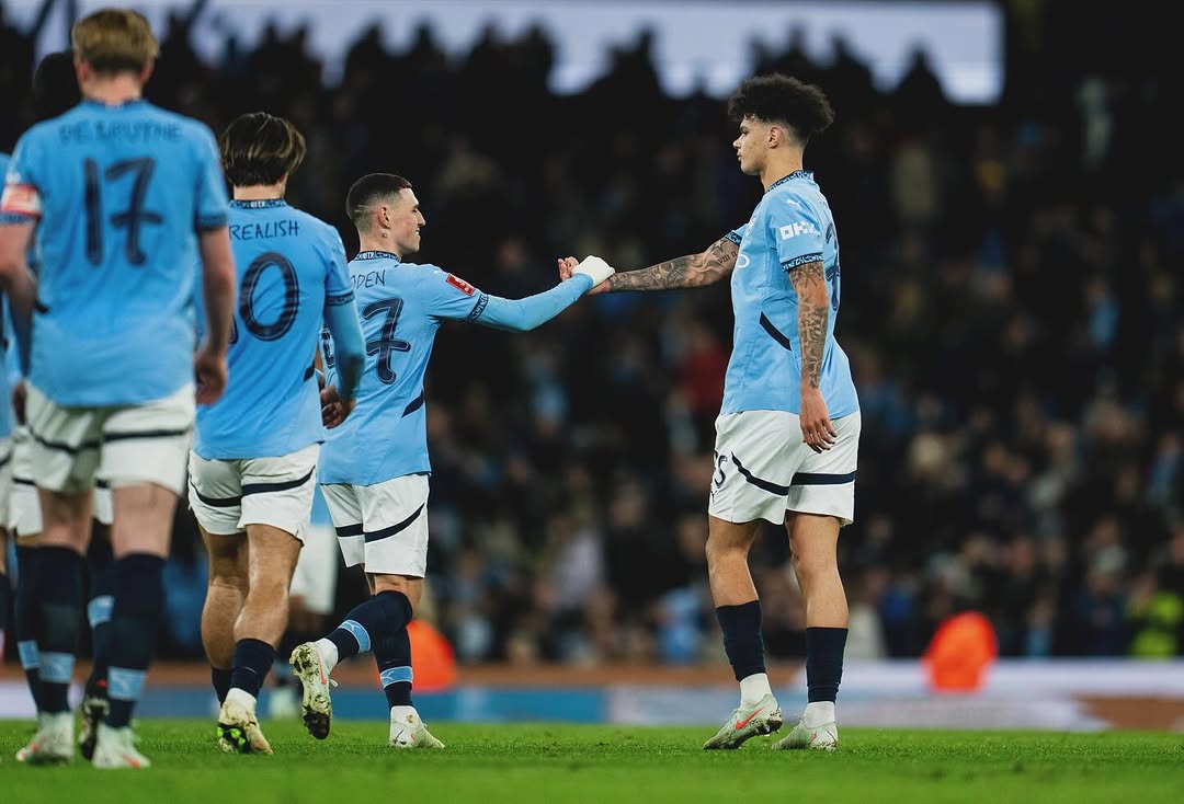 Foden and O'Rilly celebrate one of the City's goals.