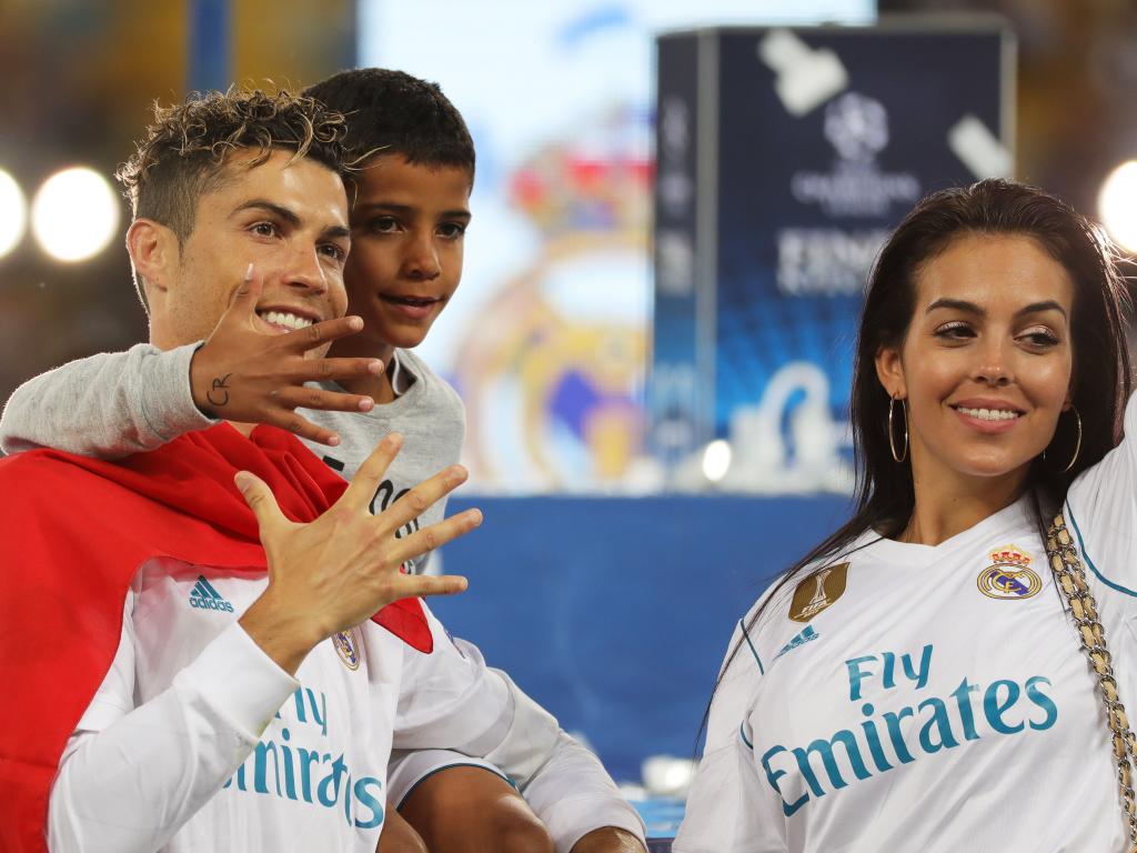 Cristiano with Jr. and Georgina in the celebration of the 2018 Champions League at Real Madrid